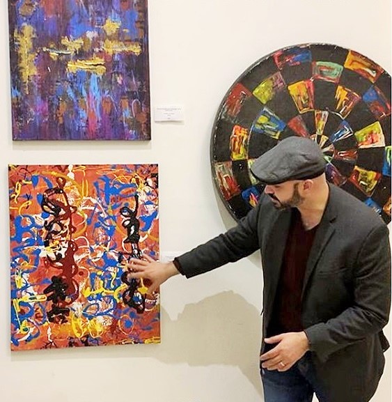 Brandon Aday discussing his work at Pridelines Gallery during Miami Art Week.